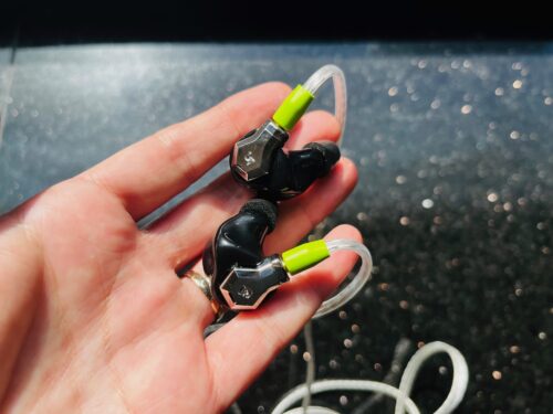 Campfire Audio Ponderosa sports lively lime green connectors on a black and steel shell.