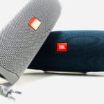 JBL Flip 5 vs JBL Charge 4 Review JBL Flip 5 on the left stacked on the JBL Charg 4 on the right