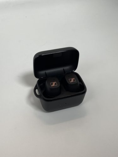 earbuds in charging case - open